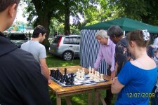 Peter Broomhall playing with giant chess set. Colin Haughton on right pondering at Wolverhampton Show Sun 12 July 2009